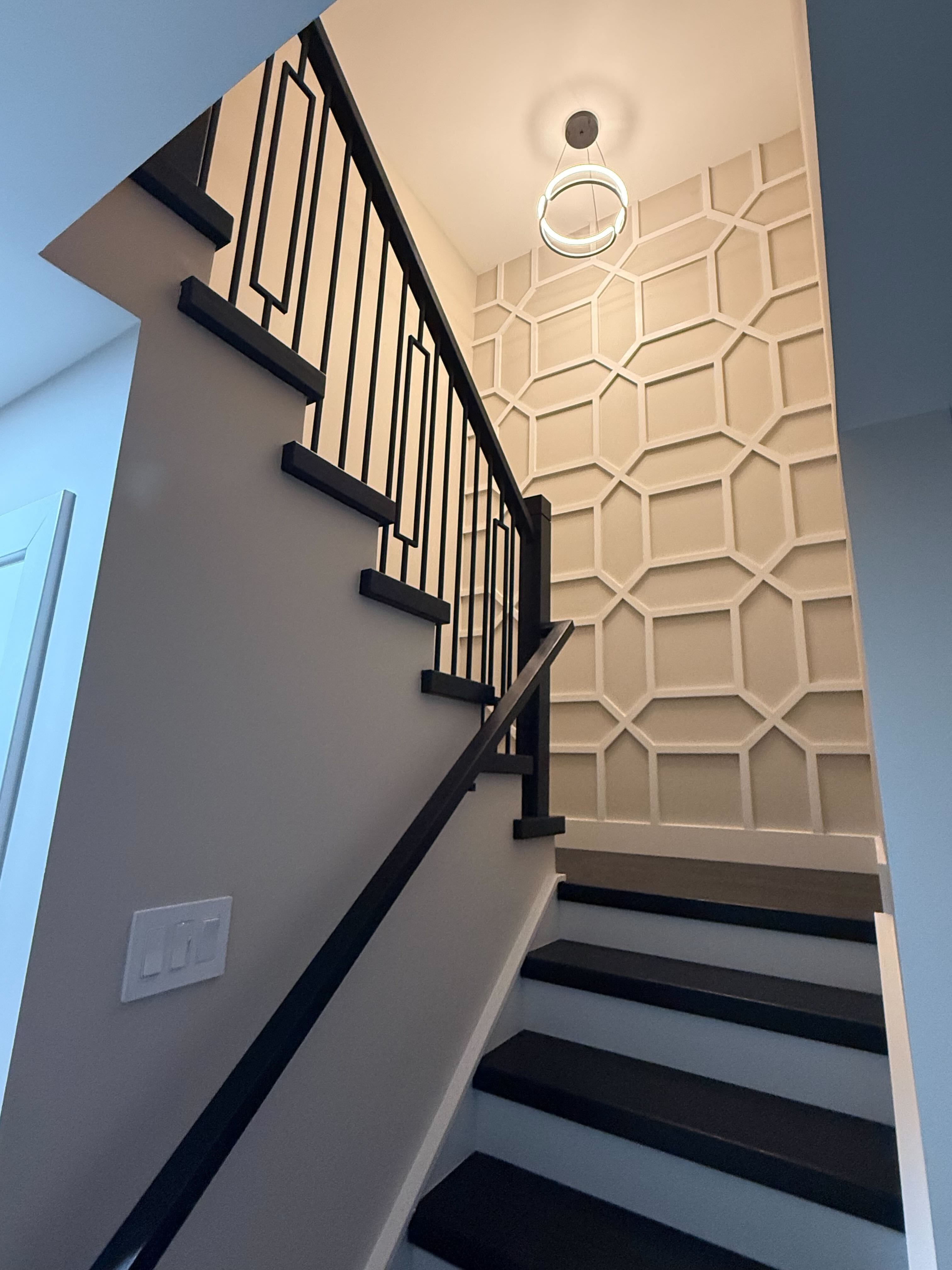 Elegant chandelier installation with dimmer controls by licensed electrician in Chicago area home