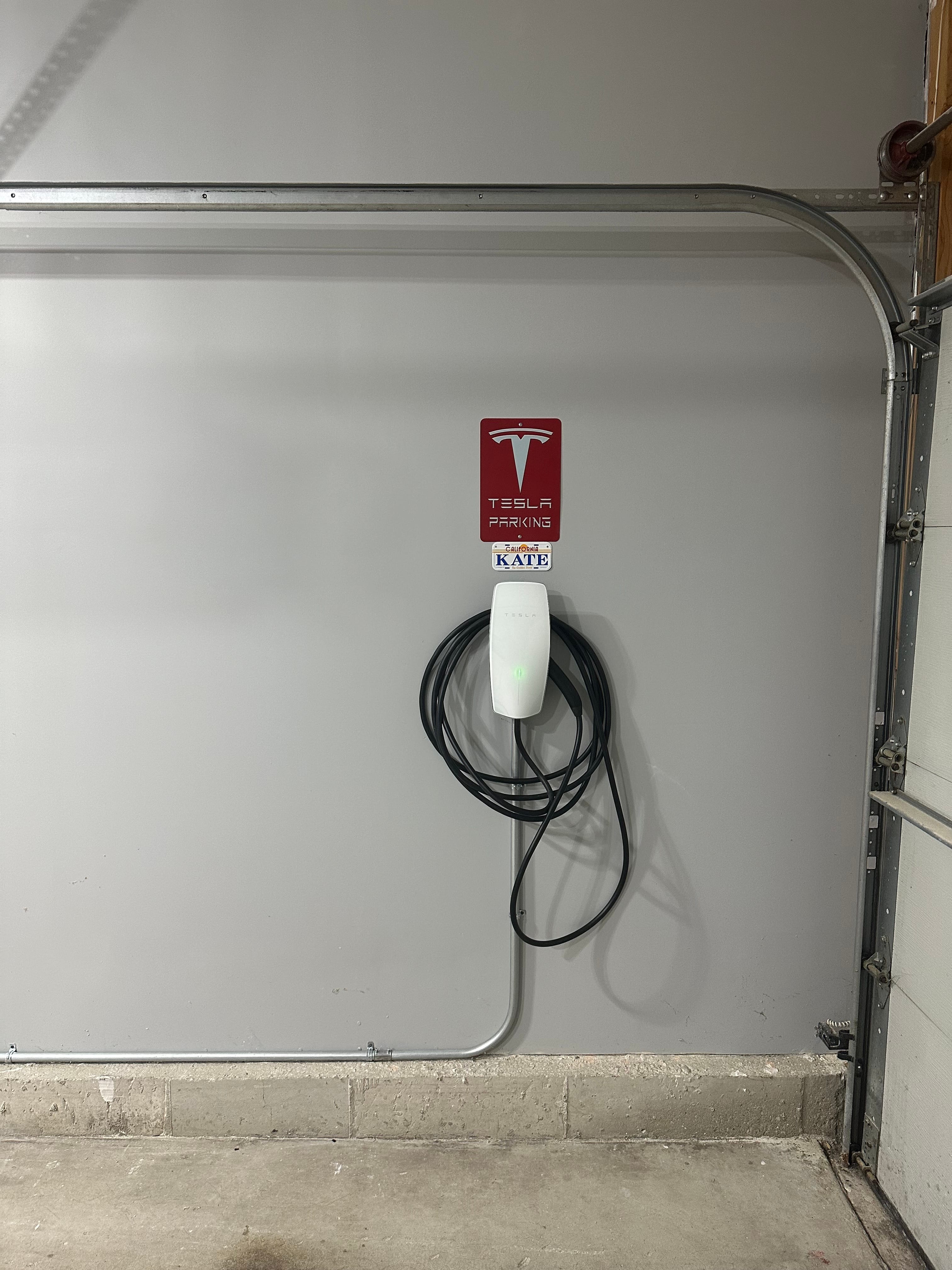 Tesla EV charger installation with dedicated 240V line by licensed electrician in Northwest Chicago Suburbs
